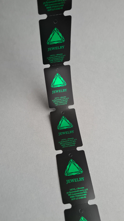 Черные матовые бирки. Печать зеленой фольгой.