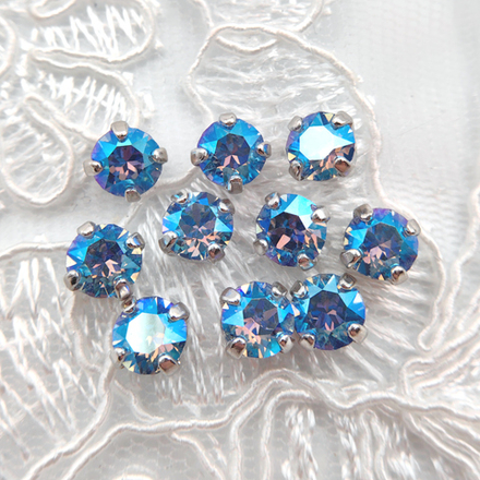 Swarovski 1088 XIRIUS Chaton в оправе, Light Sapphire Shimmer F / White Bronze