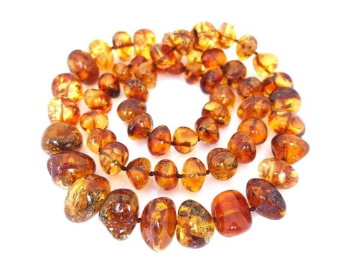 Выразительные бусы из коньячного янтаря 60 см