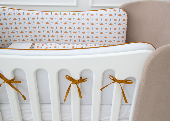 Мягкие бортики для кроватки KIDI soft "Жёлтые динозаврики" (кант, сатин)