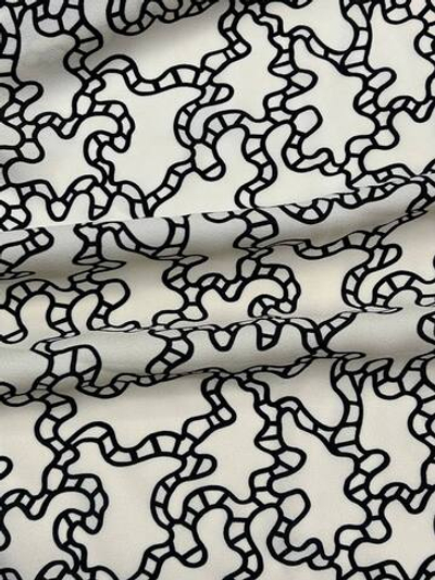 Вискоза креповая Valentino светло-песочная с черным абстрактным принтом