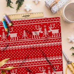 Ткань блэкаут рассредоточенная белая вышивка с оленями на красном фоне