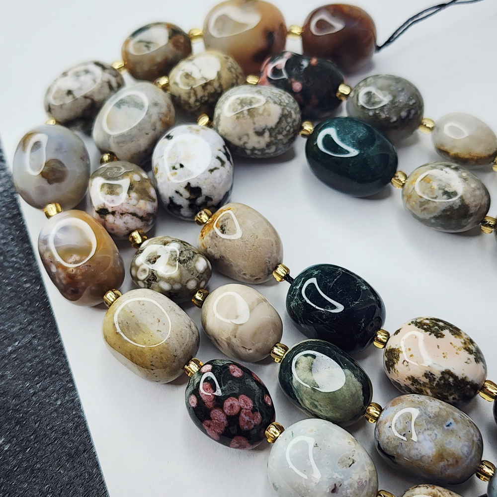 Океаническая яшма, риолит, крупная галтовка, 12-15 мм, овалы, цена за нить 12.5 - 13 см (1/3 нити)