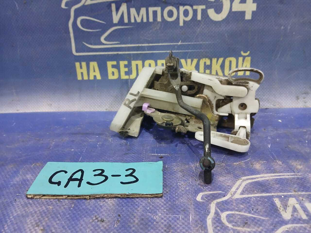 Замок двери задней левой Honda LOGO 1997