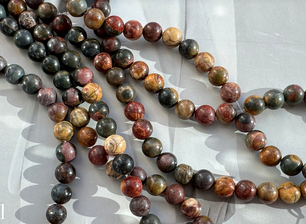 Нить бусин из яшмы 10,5мм