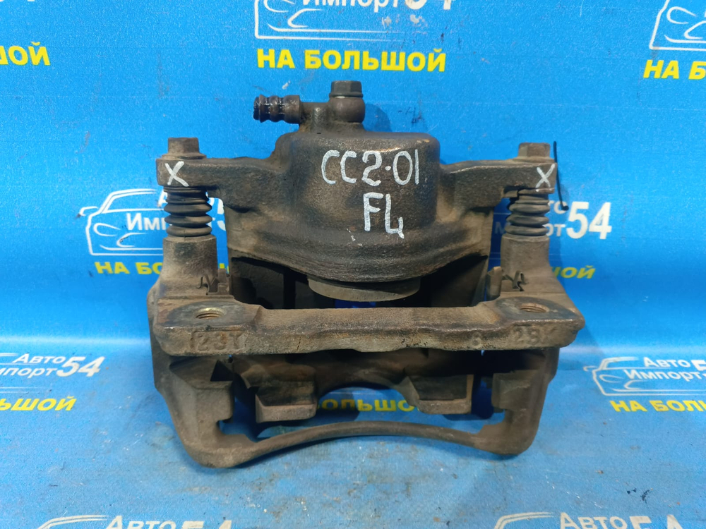 Суппорт тормозной передний левый Honda VIGOR 1992