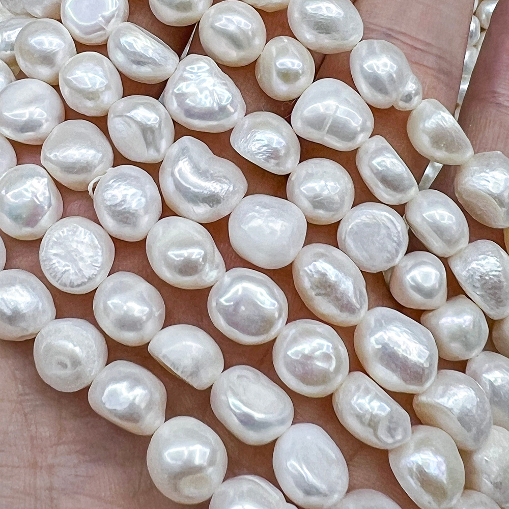 Жемчуг 2А речной бусины 9-10 мм, на нитке 38 см