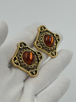 Серьги с коричневыми кабошонами Avon