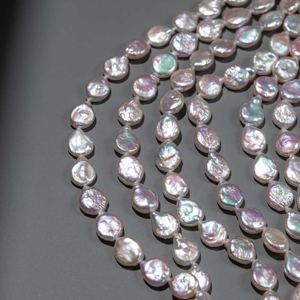 Жемчуг культивированный каплевидный с ярким розово-лиловым свечением, 10*9мм