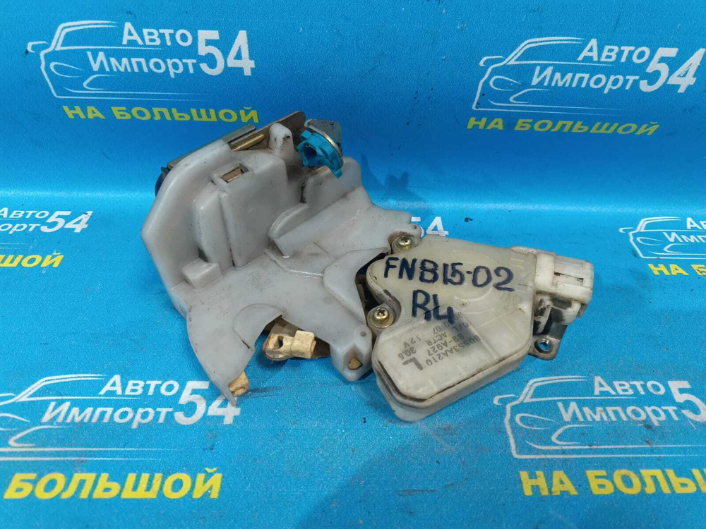 Замок двери задней левой NISSAN SUNNY 1999