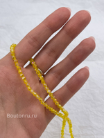 Бусины стеклянные биконусы на нити желтые