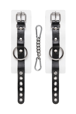Бело-черные кожаные наручники с одним ремешком с люверсами
