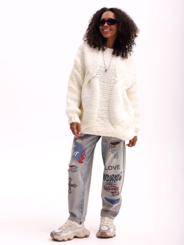 Шерстяной свитер женский