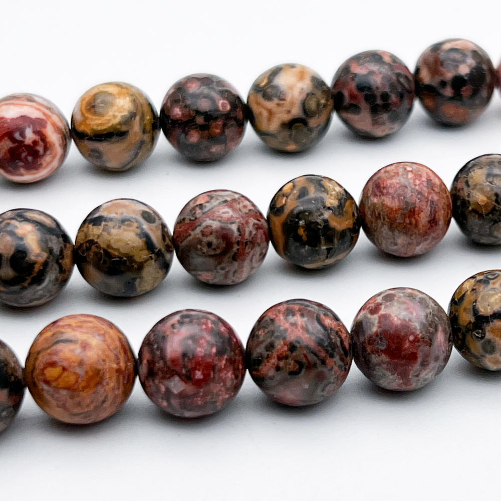 Риолит бусины, диаметр 10,5-10,6 мм, цена 18 шт (1/2 нити)