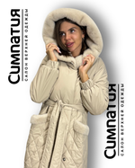 Стильное пальто в сливочном цвете с декоративными деталями