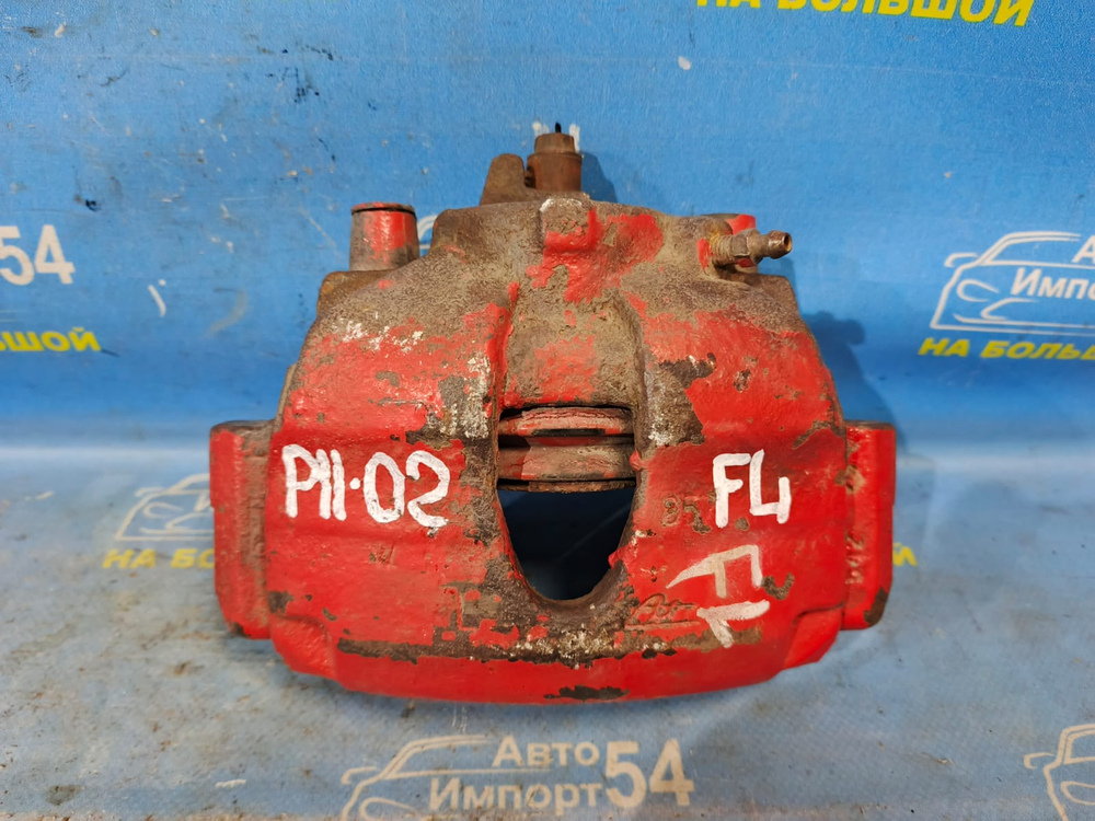 Суппорт тормозной передний левый NISSAN PRIMERA 1999