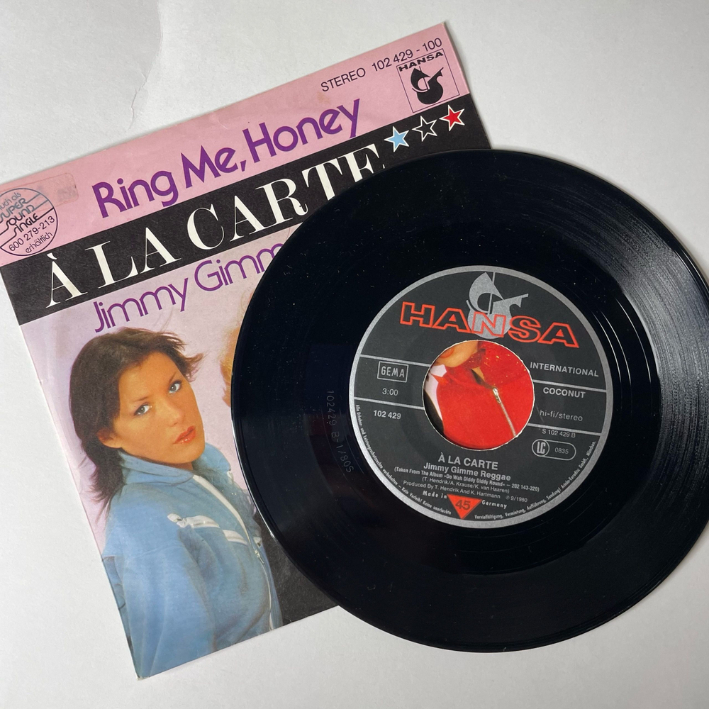 Винтажная виниловая пластинка 7 дюймов (маленькая пластинка) A La Carte Ring Me, Honey (Германия 1980)