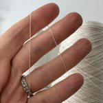 IDO MINOLA; 100% шелк; 3000м/100гр, (2/60); col.9813 blu, цвет: белый жемчужный. ТОЛЬКО бобинки: 175, 228 гр.