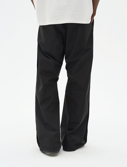 Брюки HARSHandCRUEL Wide fit Nylon Buttoned Pants