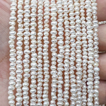 Жемчуг 2А речной бусины 2-3 мм, на нитке 38 см