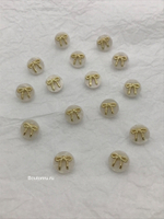 Пуговицы перламутровые бантики на ножке