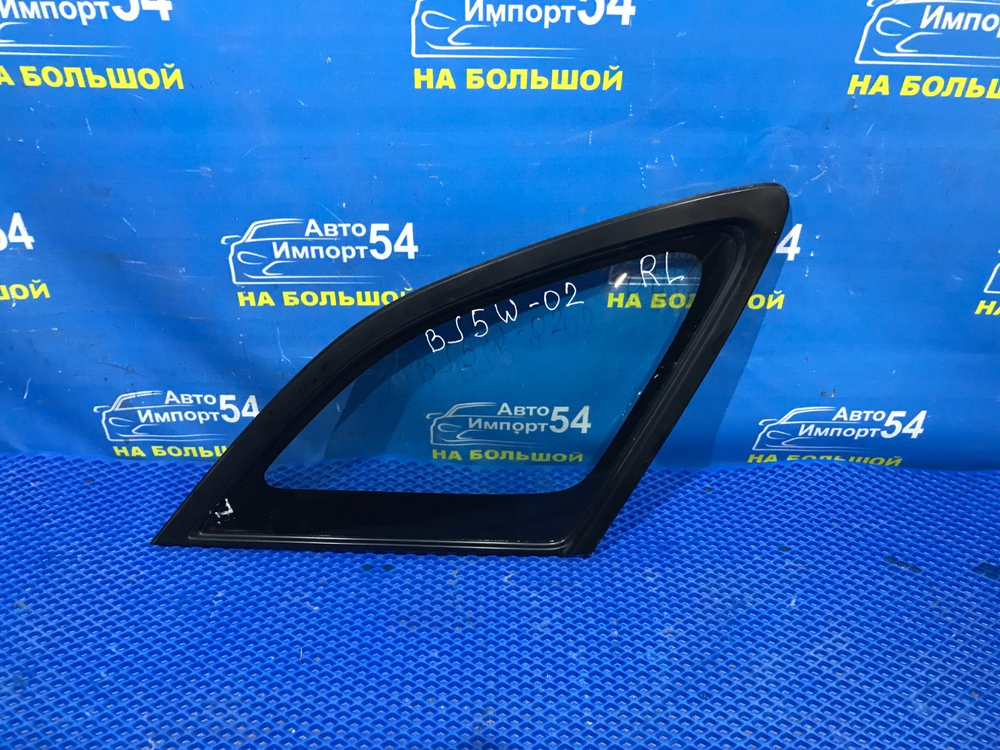 Стекло багажника левое MAZDA FAMILIA 2001
