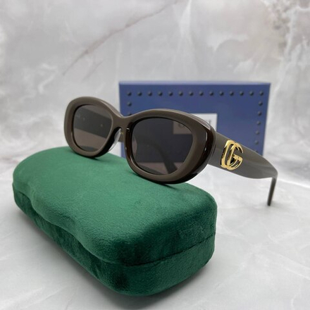 Солнцезащитные очки Gucci