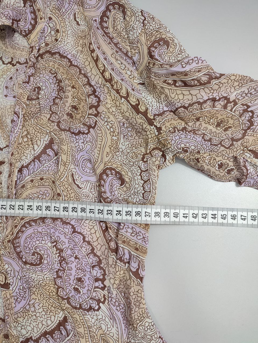 Жакет светлый с узорами 40 размер