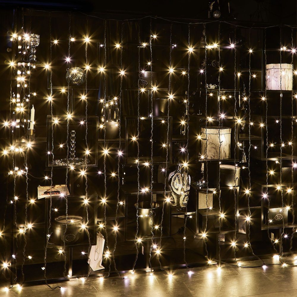 ULD-C2030-240-TBK WARM WHITE IP67 Занавес светодиодный с эффектом мерцания. 3х2м. Соединяемый. 240 светодиодов. Теплый белый свет. Провод черный. TM Uniel.