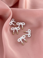 Пуговицы бантики белые