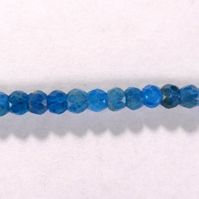 Бусина из апатита голубого, фигурная, 3x4 мм (рондель, граненая)
