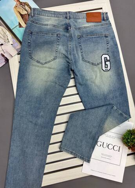 Джинсы Gucci