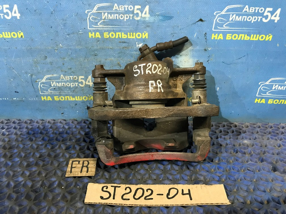 Суппорт тормозной передний правый TOYOTA CARINA ED 1994