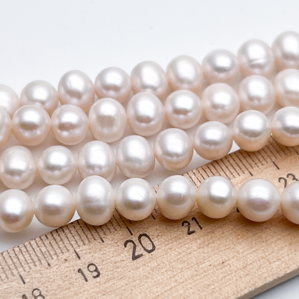 Жемчуг, размер около 8-8,5*7-7,5 мм, цена за 13-14 шт (1/4 нити)