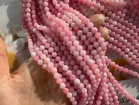 Нить бусин из тонированного кварца 6,4мм, гладкие