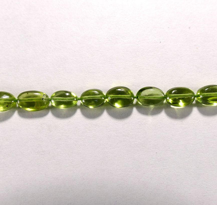 Бусина из перидота, класс АА, фигурная, 5x6 мм (овал, гладкая)
