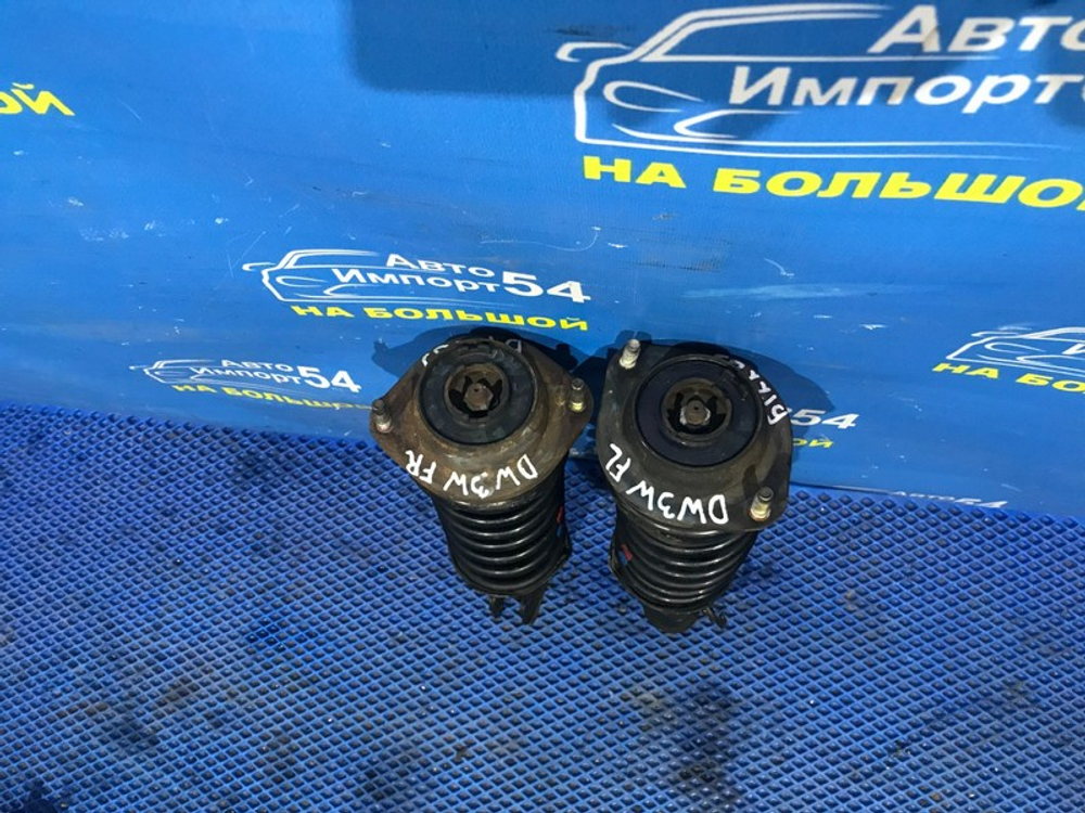 Стойка передняя левая MAZDA DEMIO 1996-2002