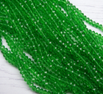 БП021НН23 Хрустальные бусины "рондель", цвет: зеленый прозрачный, 2х3 мм, кол-во: 95-100 шт.