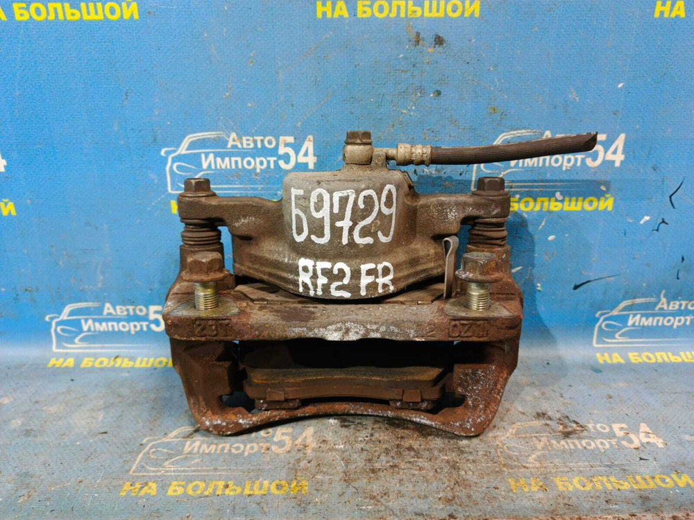 Суппорт тормозной передний правый Honda STEPWGN 1996-2001