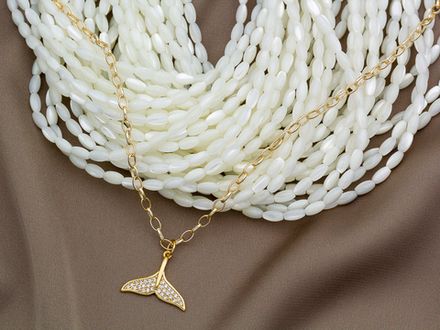 Нить бусин из перламутра "Рис" 3х5мм