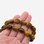 Бочонок из натурального тигрового глаза, 13-14*10мм