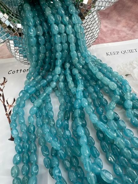 Нить бусин из тонированного кварца 7-8мм (галтовка)