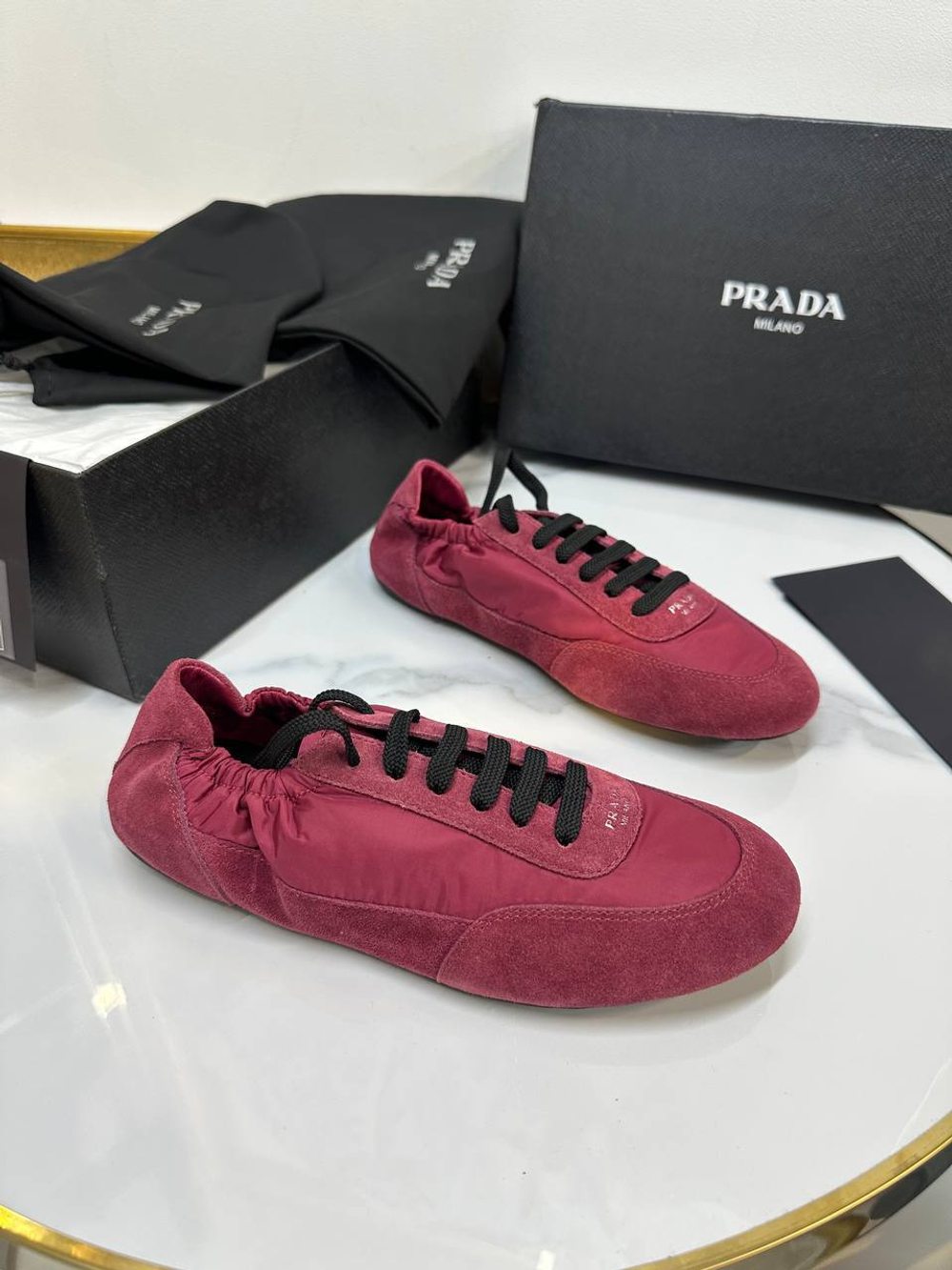 Кроссовки Prada