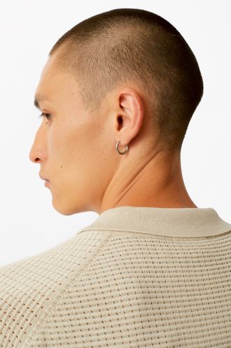 Бежевая футболка-поло Laine