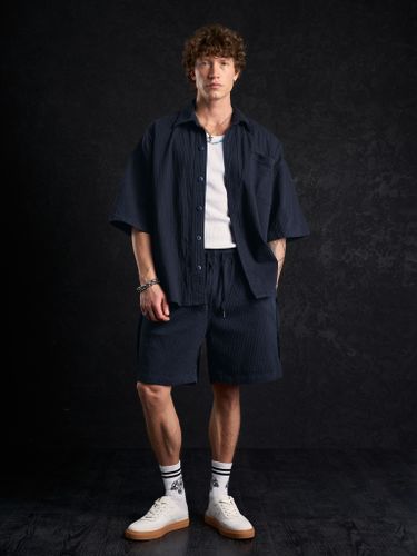 Синий хлопковый костюм в рубчик