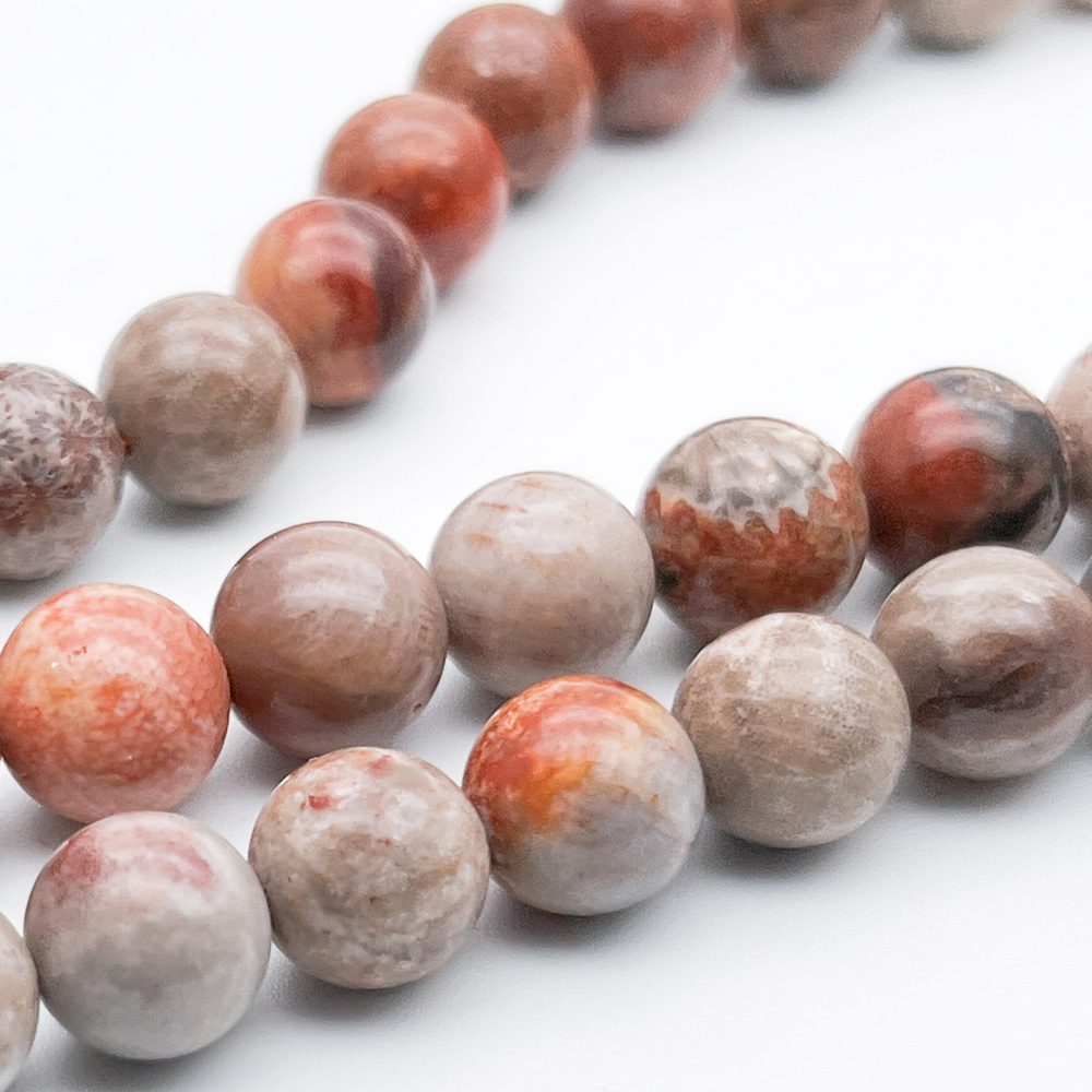 Коралл окаменелый бусины, диаметр 10,2-10,6 мм, цена за 18-19 шт (1/2 нити)