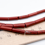 Яшма красная бусины, размер около 13,5*4 мм, цена за 13-14 шт (1/2 нити)