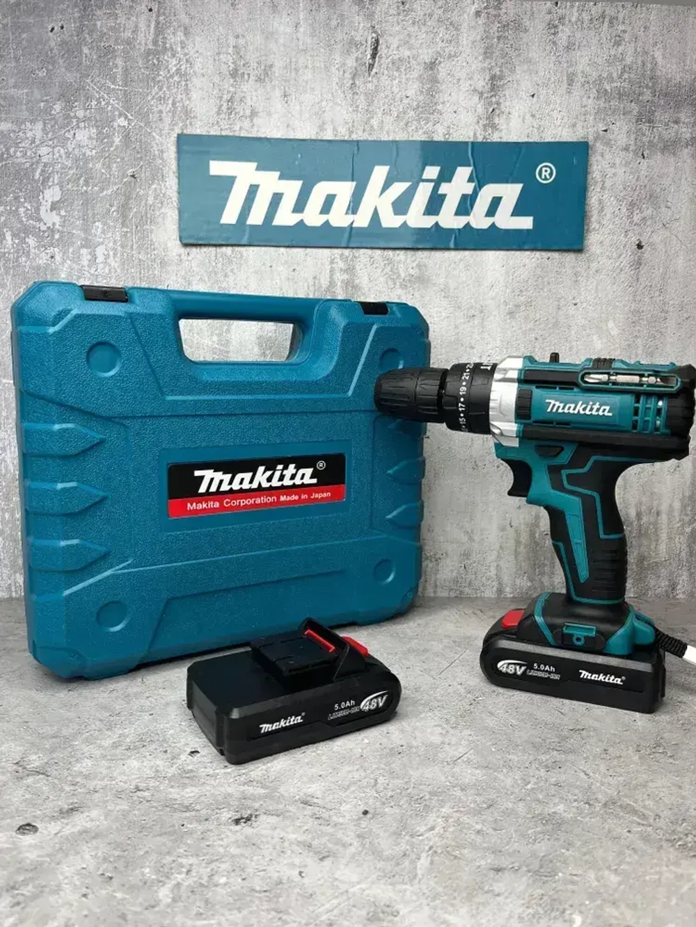 Аккумуляторная ударная дрель-шуруповёрт Makita щёточная DHP483SYT, 2 АКБ в кейсе, 48V 5Ач c набором сверл и бит в кейсе