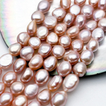 Жемчуг бусины, цвет розовый, размер около 8,8-10,2*7,3-8,2 мм, цена за 9 шт (1/4 нити)