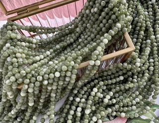 Нить бусин из тонированного кварца 6мм, гладкие